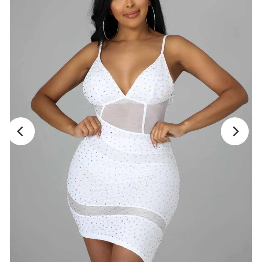 When I purchase this cocktail dress from this website, it came with no tags.